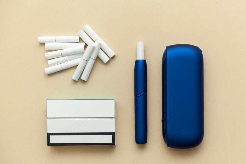 cigarrillo-electronico-iqos-azul-sobre-fondo-beige_463270-5990 (1)